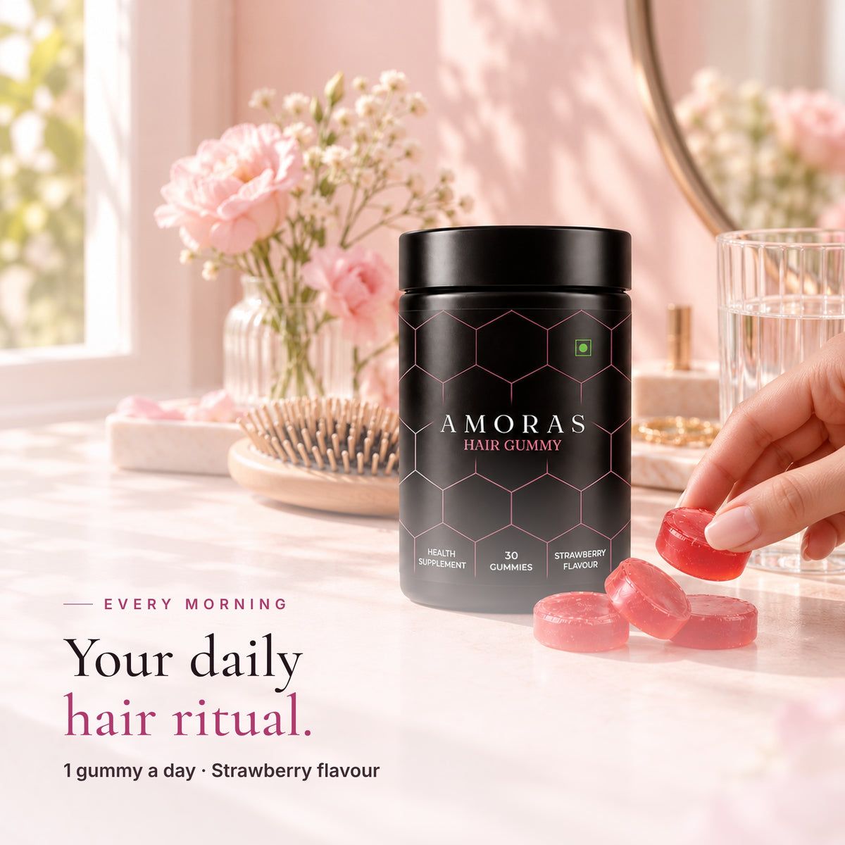 Amoras Hair Gummy on a vanity with flowers